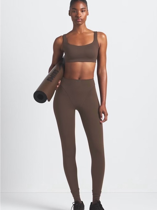 SKIMS Pants - NIKE SKIMS Sculpting High-Rise Leggings in Brown